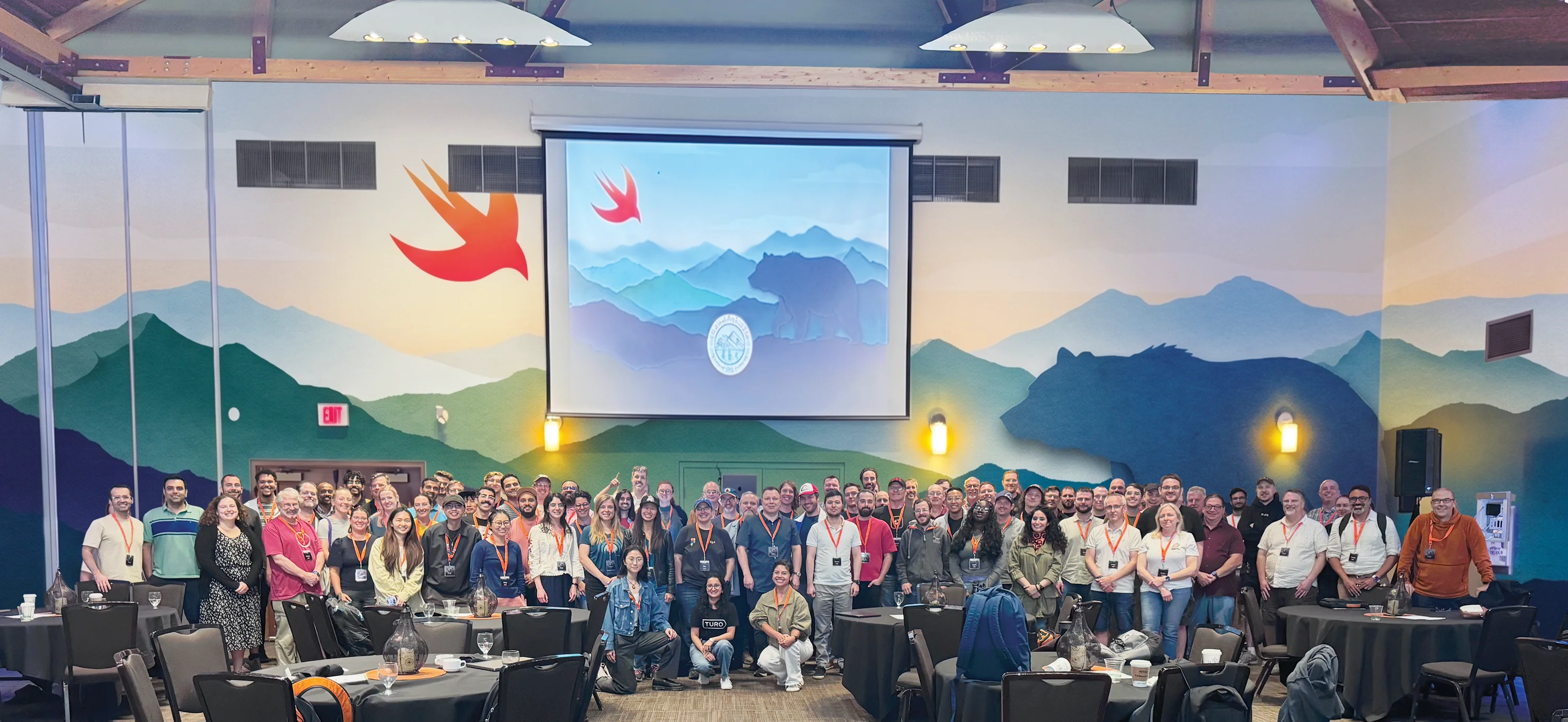 Swift Rockies 2026 group photo - attendees and speakers at the Calgary Zoo
